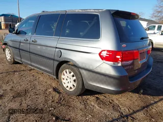 2010 Honda Odyssey LX with VIN 5FNRL3H28AB026712, listed as a IAAI auction lot 41281625 with 223,905 mi miles. Bid and sale history available at carsss.com. Image 3.