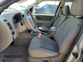 2006 Ford Escape XLT with VIN 1FMCU03116KA69312, listed as a Copart auction lot 70773514 with 164,079 mi miles and Salvage Title. Bid and sale history available at carsss.com. Image 7.