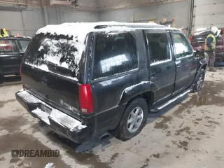1999 Cadillac Escalade z VIN 1GYEK13R6XR404534, wystawiony jako IAAI lot #41391379 z przebiegiem 127 612 mil mil oraz . Historia ofert i sprzedaży dostępna na DreamBid. Obrazek 4.