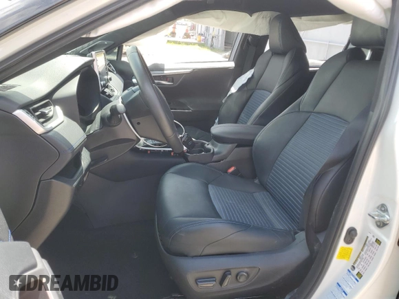 2021 Toyota RAV4 Hybrid XSE with VIN 4T3E6RFV3MU061808, listed as a Copart auction lot 57048025 with 20,614 mi miles and Salvage title. Bid and sale history available at DreamBid. Image 7.