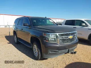 2015 Chevrolet Tahoe LS with VIN 1GNSCAKC9FR122896, listed as a IAAI auction lot 42239812 with 164,888 mi miles and . Bid and sale history available at DreamBid. Image 12.