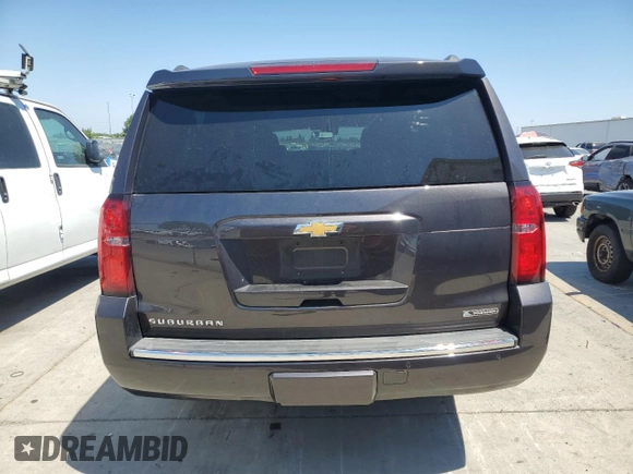 2018 Chevrolet Suburban Premier with VIN 1GNSCJKC4JR189639, listed as a Copart auction lot 64221035 with 110,256 mi miles and Salvage title. Bid and sale history available at DreamBid. Image 6.
