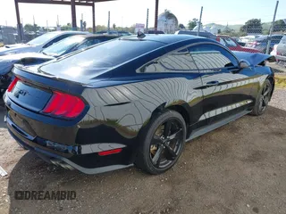 2023 Ford Mustang GT with VIN 1FA6P8CF6P5302934, listed as a IAAI auction lot 41943040 with 23,158 mi miles and . Bid and sale history available at carsss.com. Image 4.