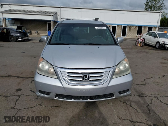 2010 Honda Odyssey EX z VIN 5FNRL3H43AB095521, wystawiony jako Copart lot #57322365 z przebiegiem 208 226 mil mil oraz Szkoda całkowita • Salvage title. Historia ofert i sprzedaży dostępna na DreamBid. Obrazek 5.