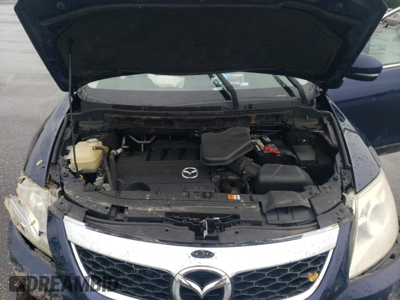 2011 Mazda CX-9 Grand Touring with VIN JM3TB2DA0B0320628, listed as a Copart auction lot 56310725 with 119,068 mi miles and Salvage title. Bid and sale history available at DreamBid. Image 12.