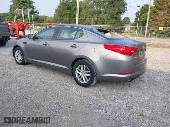 2013 Kia Optima LX z VIN 5XXGM4A79DG200479, wystawiony jako IAAI lot #42412641 z przebiegiem 183 916 mil mil oraz . Historia ofert i sprzedaży dostępna na DreamBid. Obrazek 3.