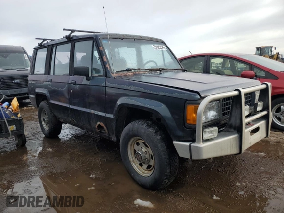 1991 Isuzu Trooper z VIN JACCH58E3M7900325, wystawiony jako Copart lot #79525294 z przebiegiem 146 593 mil mil oraz Czysty tytuł • Clean title. Historia ofert i sprzedaży dostępna na DreamBid. Obrazek 4.