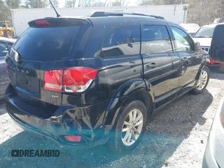 2017 Dodge Journey SXT with VIN 3C4PDCBG5HT604947, listed as a IAAI auction lot 41851008 with 208,674 mi miles and . Bid and sale history available at carsss.com. Image 4.