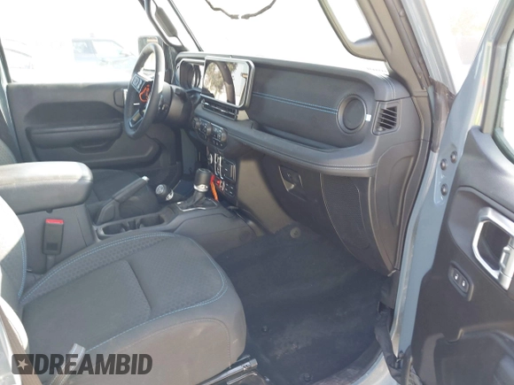 2024 Jeep Wrangler Rubicon with VIN 1C4RJXR67RW149021, listed as a IAAI auction lot 42510809 with 10,722 mi miles and . Bid and sale history available at DreamBid. Image 5.