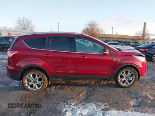 2015 Ford Escape Titanium with VIN 1FMCU9J99FUB34831, listed as a IAAI auction lot 41278305 with 59,658 mi miles and . Bid and sale history available at DreamBid. Image 13.