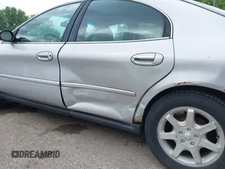 2002 Mercury Sable GS z VIN 1MEFM50U52G650143, wystawiony jako IAAI lot #42525337 z przebiegiem 151 079 mil mil oraz . Historia ofert i sprzedaży dostępna na DreamBid. Obrazek 6.