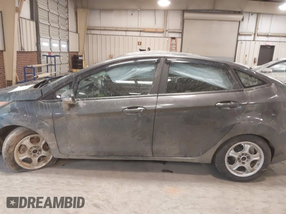 2015 Ford Fiesta SE with VIN 3FADP4BJ7FM218586, listed as a IAAI auction lot 41603479 with 97,460 mi miles. Bid and sale history available at carsss.com. Image 14.