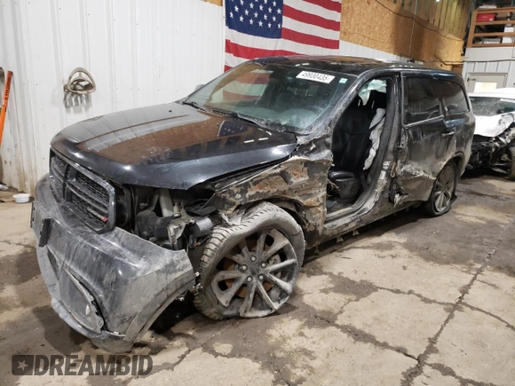2014 Dodge Durango R/T with VIN 1C4SDJCT9EC977300, listed as a Copart auction lot 49930435 with 165,569 mi miles and Salvage title. Bid and sale history available at DreamBid. Image 1.