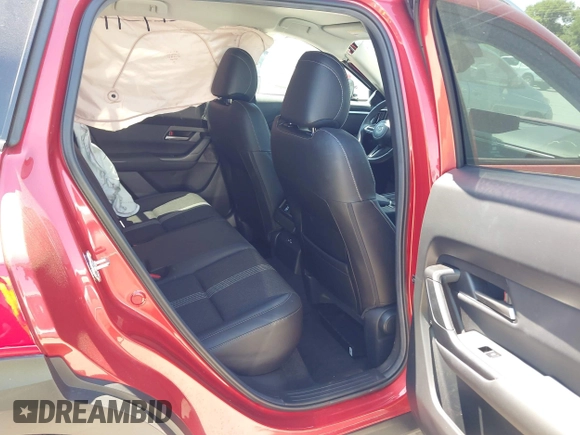2024 Mazda CX-50 S Select with VIN 7MMVABAM4RN242452, listed as a IAAI auction lot 42027929 with 8,931 mi miles and . Bid and sale history available at DreamBid. Image 8.