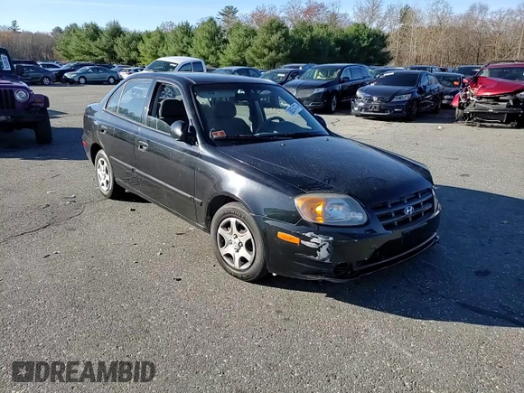 2005 Hyundai Accent GLS z VIN KMHCG45C15U662362, wystawiony jako Copart lot #80574774 z przebiegiem 122 898 mil mil oraz Szkoda całkowita • Salvage title. Historia ofert i sprzedaży dostępna na DreamBid. Obrazek 10.