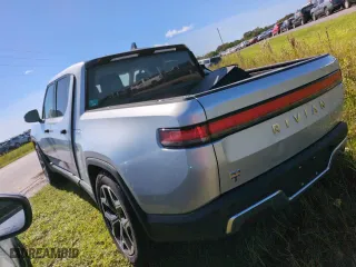 2023 Rivian R1T Adventure with VIN 7FCTGAAA5PN019317, listed as a Copart auction lot 74416784 with 11,508 mi miles and Salvage Title. Bid and sale history available at carsss.com. Image 2.