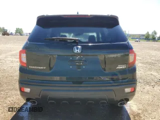 2019 Honda Passport Sport z VIN 5FNYF8H20KB502873, wystawiony jako Copart lot #58920825 z przebiegiem Nie podano mil oraz Szkody całkowita. Historia ofert i sprzedaży dostępna na DreamBid. Obrazek 6.
