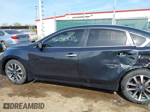 2016 Nissan Altima SR with VIN 1N4AL3AP1GC204703, listed as a IAAI auction lot 42040016 with 88,304 mi miles and . Bid and sale history available at DreamBid. Image 14.