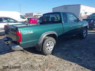 2000 Nissan Frontier 2WD XE with VIN 1N6ED26T2YC427520, listed as a IAAI auction lot 41478878 with 215,250 mi miles. Bid and sale history available at carsss.com. Image 4.