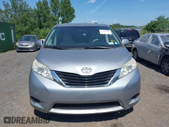2011 Toyota Sienna LE AAS with VIN 5TDKK3DC2BS096965, listed as a IAAI auction lot 42583783 with 288,489 mi miles and . Bid and sale history available at DreamBid. Image 12.
