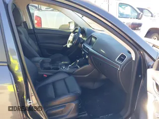 2016 Mazda CX-5 Grand Touring with VIN JM3KE2DYXG0784615, listed as a IAAI auction lot 41846853 with 72,185 mi miles. Bid and sale history available at carsss.com. Image 5.