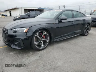 2023 Audi RS 5 Sportback z VIN WUAAWCF50PA904252, wystawiony jako Copart lot #56142695 z przebiegiem 9745 mil mil oraz Szkoda całkowita • Salvage title. Historia ofert i sprzedaży dostępna na DreamBid. Obrazek 1.