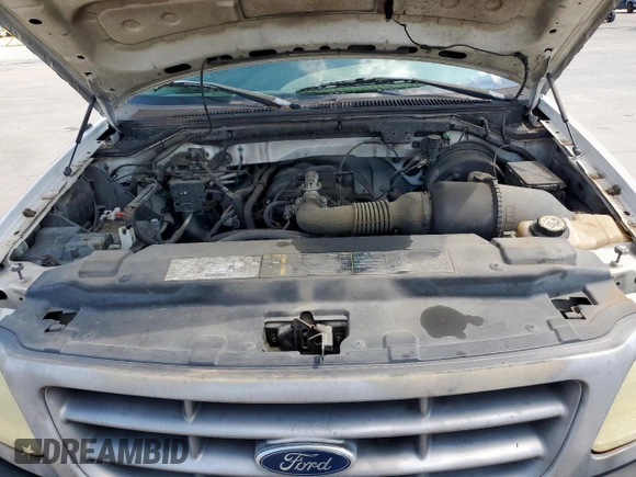 2003 Ford F-150 XL z VIN 1FTRF17263NB24929, wystawiony jako Copart lot #65346085 z przebiegiem 203 401 mil mil oraz Czysty tytuł • Clean title. Historia ofert i sprzedaży dostępna na DreamBid. Obrazek 11.