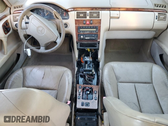1998 Mercedes-Benz E 320 with VIN WDBJF25F4WA625790, listed as a Copart auction lot 87920735 with 179,382 mi miles and Clean Title. Bid and sale history available at DreamBid. Image 8.