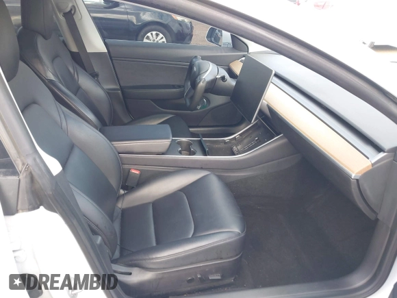 2019 Tesla Model 3 Long Range with VIN 5YJ3E1EBXKF512710, listed as a IAAI auction lot 42063737 with 90,721 mi miles and . Bid and sale history available at DreamBid. Image 5.