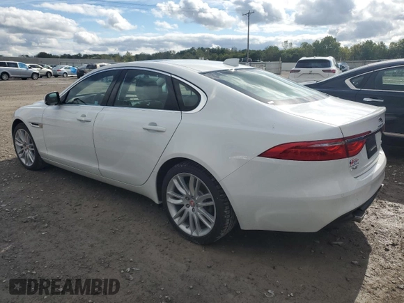 2016 Jaguar XF 35t Prestige with VIN SAJBK4BV3GCY19128, listed as a Copart auction lot 74187394 with 70,510 mi miles and Salvage Title. Bid and sale history available at carsss.com. Image 2.