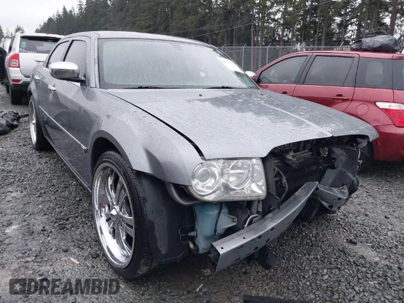 2006 Chrysler 300 C with VIN 2C3KA63H06H286676, listed as a IAAI auction lot 41231230 with 134,565 mi miles. Bid and sale history available at carsss.com. Image 1.