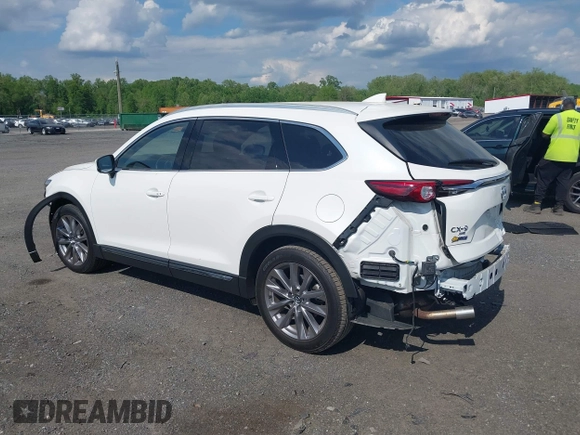 2021 Mazda CX-9 Grand Touring with VIN JM3TCBDY2M0541290, listed as a IAAI auction lot 42216643 with 38,661 mi miles and . Bid and sale history available at DreamBid. Image 14.