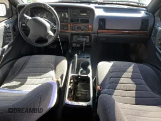 1997 Jeep Grand Cherokee Laredo with VIN 1J4GZ58SXVC569171, listed as a Copart auction lot 45657745 with 101,648 mi miles and Salvage Title. Bid and sale history available at carsss.com. Image 8.