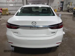 2019 Mazda 6 Grand Touring with VIN JM1GL1TYXK1505439, listed as a IAAI auction lot 41672678 with 52,990 mi miles and . Bid and sale history available at carsss.com. Image 16.