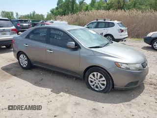 2012 Kia Forte EX with VIN KNAFU4A29C5574316, listed as a IAAI auction lot 42104534 with 195,993 mi miles. Bid and sale history available at carsss.com. Image 1.
