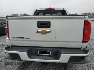 2019 Chevrolet Colorado 2WD Work Truck z VIN 1GCGSBEN2K1168373, wystawiony jako Copart lot #83449894 z przebiegiem 65 028 mil mil oraz Szkoda całkowita • Salvage title. Historia ofert i sprzedaży dostępna na DreamBid. Obrazek 6.