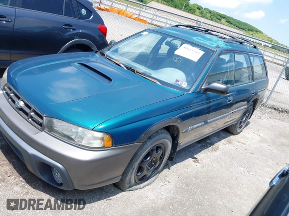 1997 Subaru Legacy Outback z VIN 4S3BG6859V6613083, wystawiony jako IAAI lot #42623719 z przebiegiem 150 558 mil mil oraz . Historia ofert i sprzedaży dostępna na DreamBid. Obrazek 2.