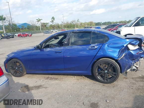 2020 BMW 3 Series M340i xDrive with VIN WBA5U9C00LA379345, listed as a IAAI auction lot 41256225 with 57,856 mi miles and . Bid and sale history available at DreamBid. Image 14.