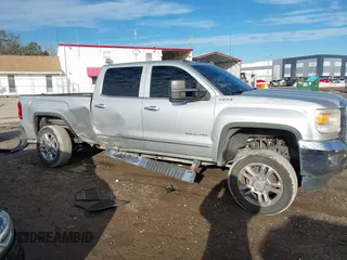 2015 GMC Sierra 2500HD available WiFi SLT with VIN 1GT12ZEG7FF167096, listed as a IAAI auction lot 41408317 with 152,969 mi miles. Bid and sale history available at carsss.com. Image 13.
