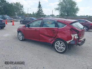 2017 Ford Focus Titanium with VIN 1FADP3N24HL294690, listed as a IAAI auction lot 39893510 with 123,089 mi miles and . Bid and sale history available at DreamBid. Image 3.