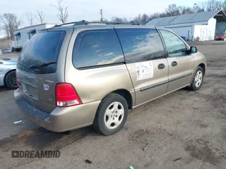 2005 Ford Freestar SE z VIN 2FMZA51645BA05742, wystawiony jako IAAI lot #41429194 z przebiegiem 145 415 mil mil oraz . Historia ofert i sprzedaży dostępna na DreamBid. Obrazek 4.