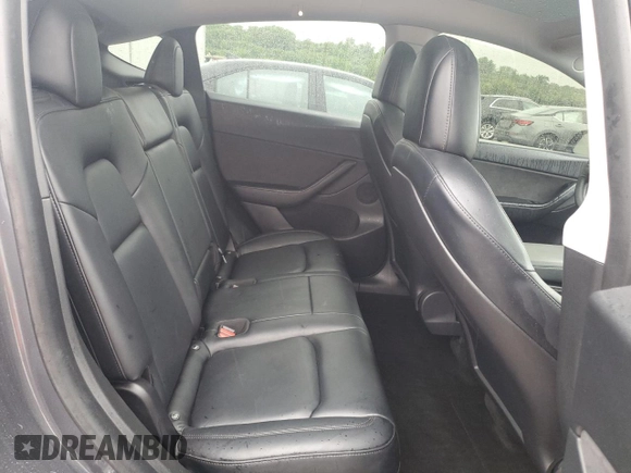 2021 Tesla Model Y Long Range z VIN 5YJYGDEE6MF209034, wystawiony jako Copart lot #57313585 z przebiegiem 54 259 mil mil oraz Szkoda całkowita • Salvage title. Historia ofert i sprzedaży dostępna na DreamBid. Obrazek 10.