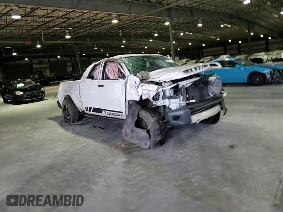 2016 Toyota Tundra SR z VIN 5TFRM5F11GX100988, wystawiony jako Copart lot #86719774 z przebiegiem Nie podano mil oraz Szkoda całkowita • Salvage title. Historia ofert i sprzedaży dostępna na DreamBid. Obrazek 11.