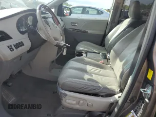 2011 Toyota Sienna XLE AAS with VIN 5TDYK3DC5BS010512, listed as a Copart auction lot 58614775 with 215,020 mi miles and Clean title. Bid and sale history available at DreamBid. Image 7.