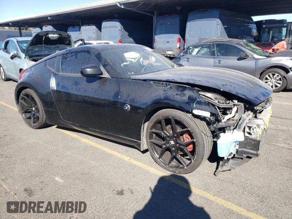 2015 Nissan 370Z with VIN JN1AZ4EHXFM444295, listed as a Copart auction lot 78216194 with 0 mi miles and Salvage Title. Bid and sale history available at carsss.com. Image 4.