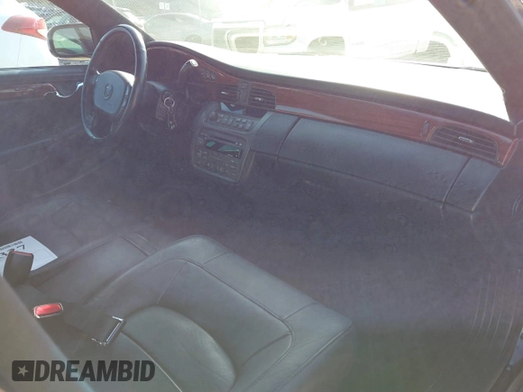 2005 Cadillac DeVille z VIN 1G6KD54Y55U196790, wystawiony jako IAAI lot #41721327 z przebiegiem 85 635 mil mil oraz . Historia ofert i sprzedaży dostępna na DreamBid. Obrazek 5.