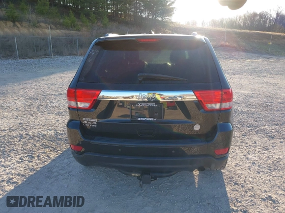 2012 Jeep Grand Cherokee Laredo with VIN 1C4RJFAG3CC246577, listed as a IAAI auction lot 41807693 with 164,574 mi miles. Bid and sale history available at carsss.com. Image 16.