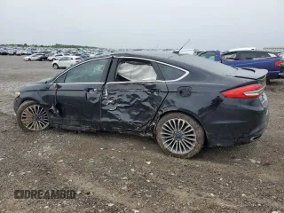 2018 Ford Fusion Titanium с VIN 3FA6P0K91JR183997, выставлен на аукционе Copart как лот 57717235 с пробегом 133 385 миль миль и Списание • Salvage title. История ставок и продаж доступна на DreamBid. Изображение 2.