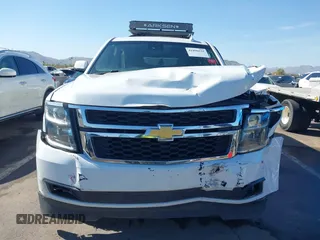 2019 Chevrolet Suburban LT with VIN 1GNSCHKC3KR143942, listed as a IAAI auction lot 41896633 with 153,139 mi miles and . Bid and sale history available at DreamBid. Image 6.