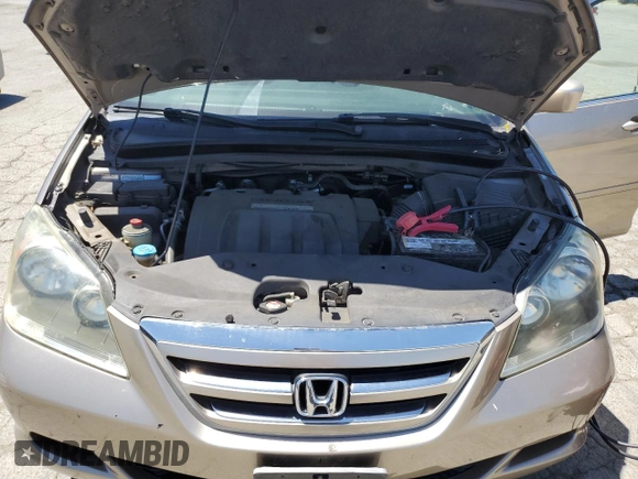 2005 Honda Odyssey EX-L with VIN 5FNRL38625B045152, listed as a Copart auction lot 57633005 with 145,776 mi miles and Salvage title. Bid and sale history available at DreamBid. Image 12.